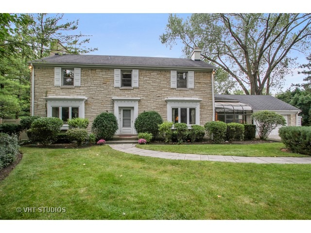 270 Locust Road Winnetka, IL 60093 - Photo 1 of 1 a front view of a house with a yard