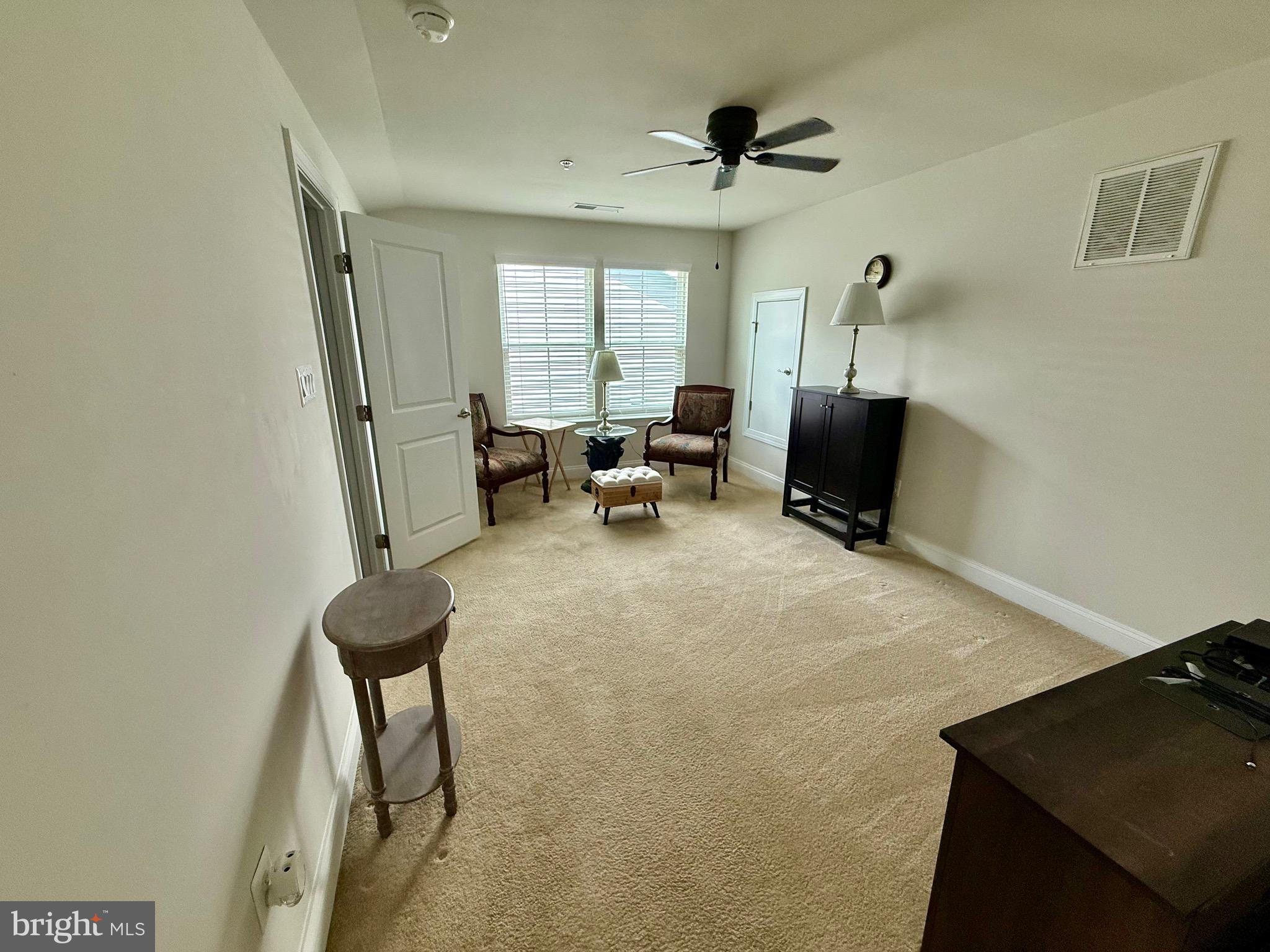 3148 Sunny Ridge Drive Odenton, MD 21113 - Photo 18 of 32 a living room with furniture and a window
