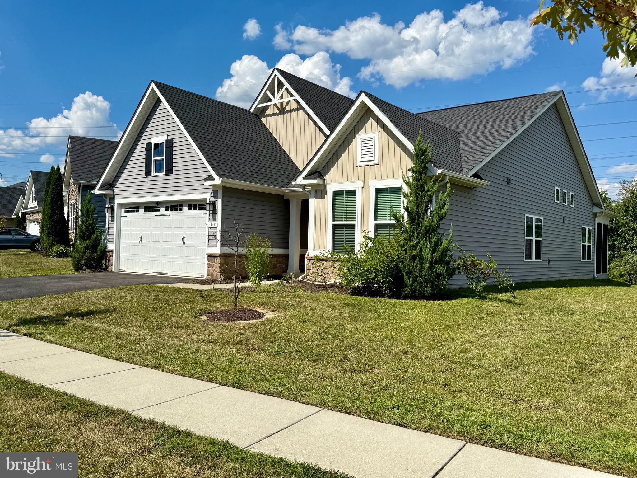 3148 Sunny Ridge Drive Odenton, MD 21113 - Photo 29 of 32 a front view of a house with a yard
