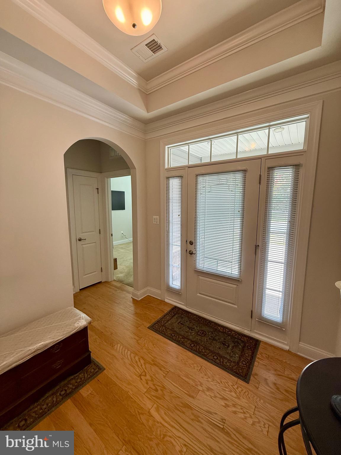 3148 Sunny Ridge Drive Odenton, MD 21113 - Photo 3 of 32 a view of empty room with wooden floor and fan
