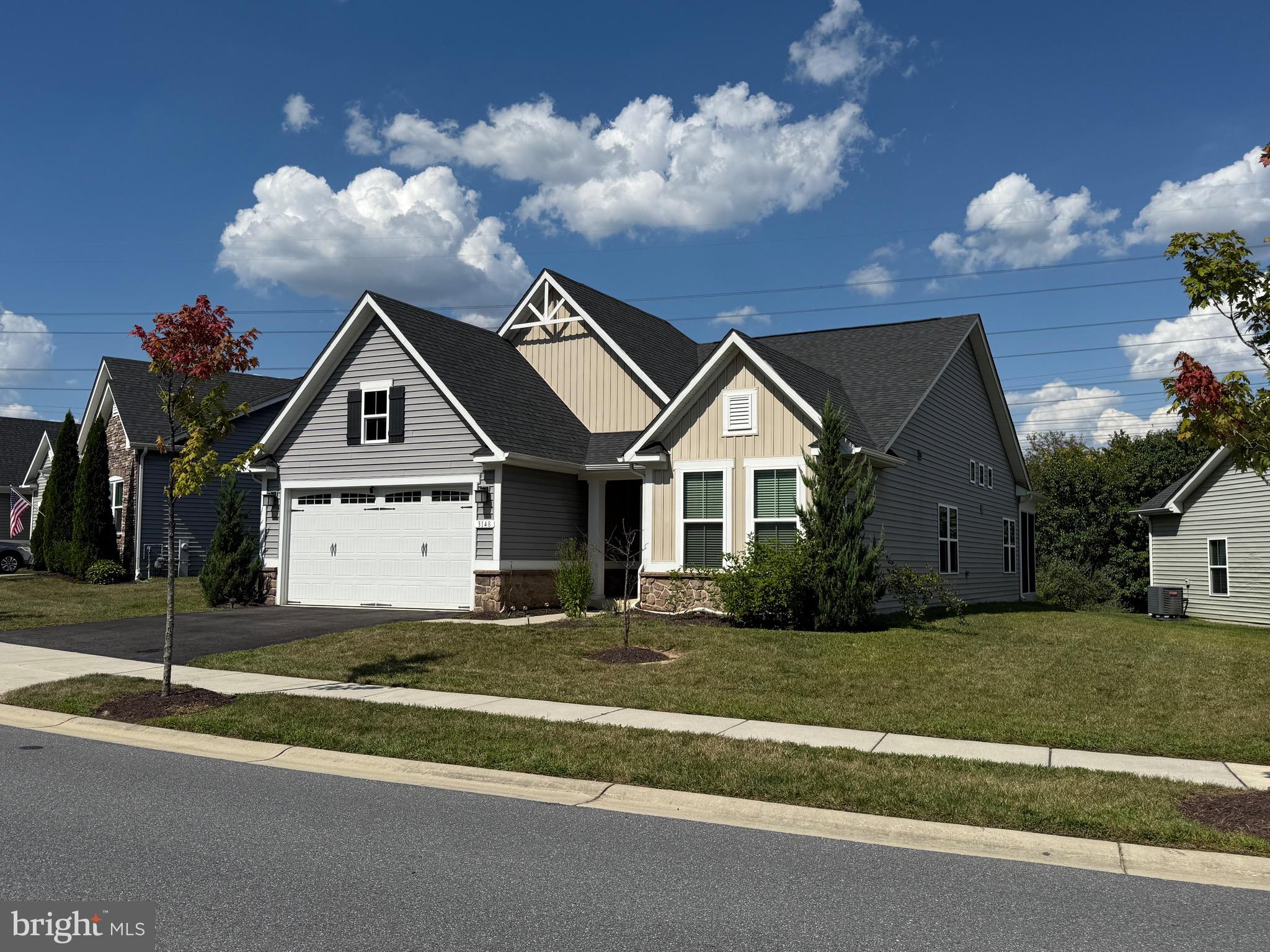 3148 Sunny Ridge Drive Odenton, MD 21113 - Photo 32 of 32 a front view of a house with a yard