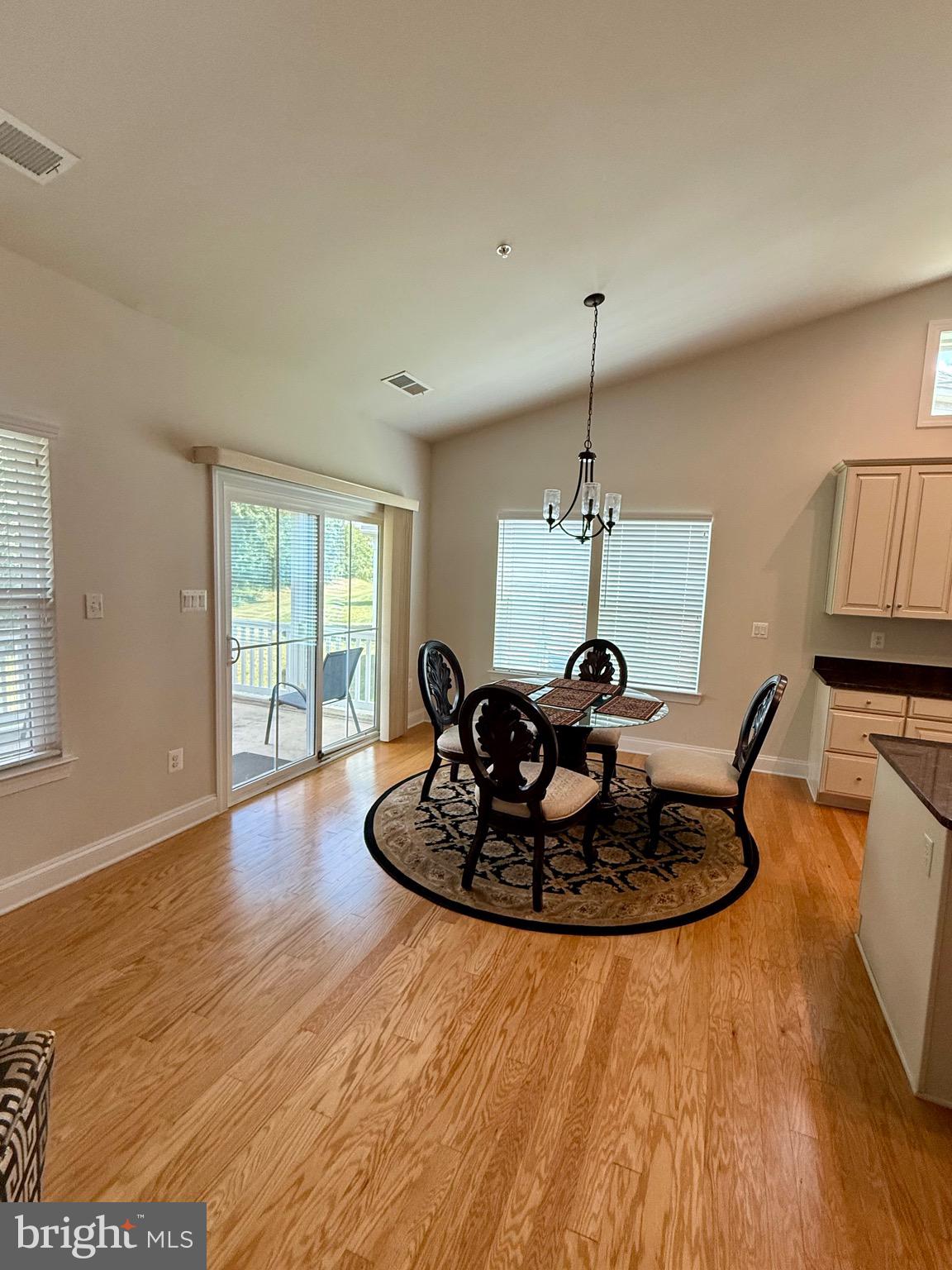 3148 Sunny Ridge Drive Odenton, MD 21113 - Photo 7 of 32 a living room with furniture and a wooden floor
