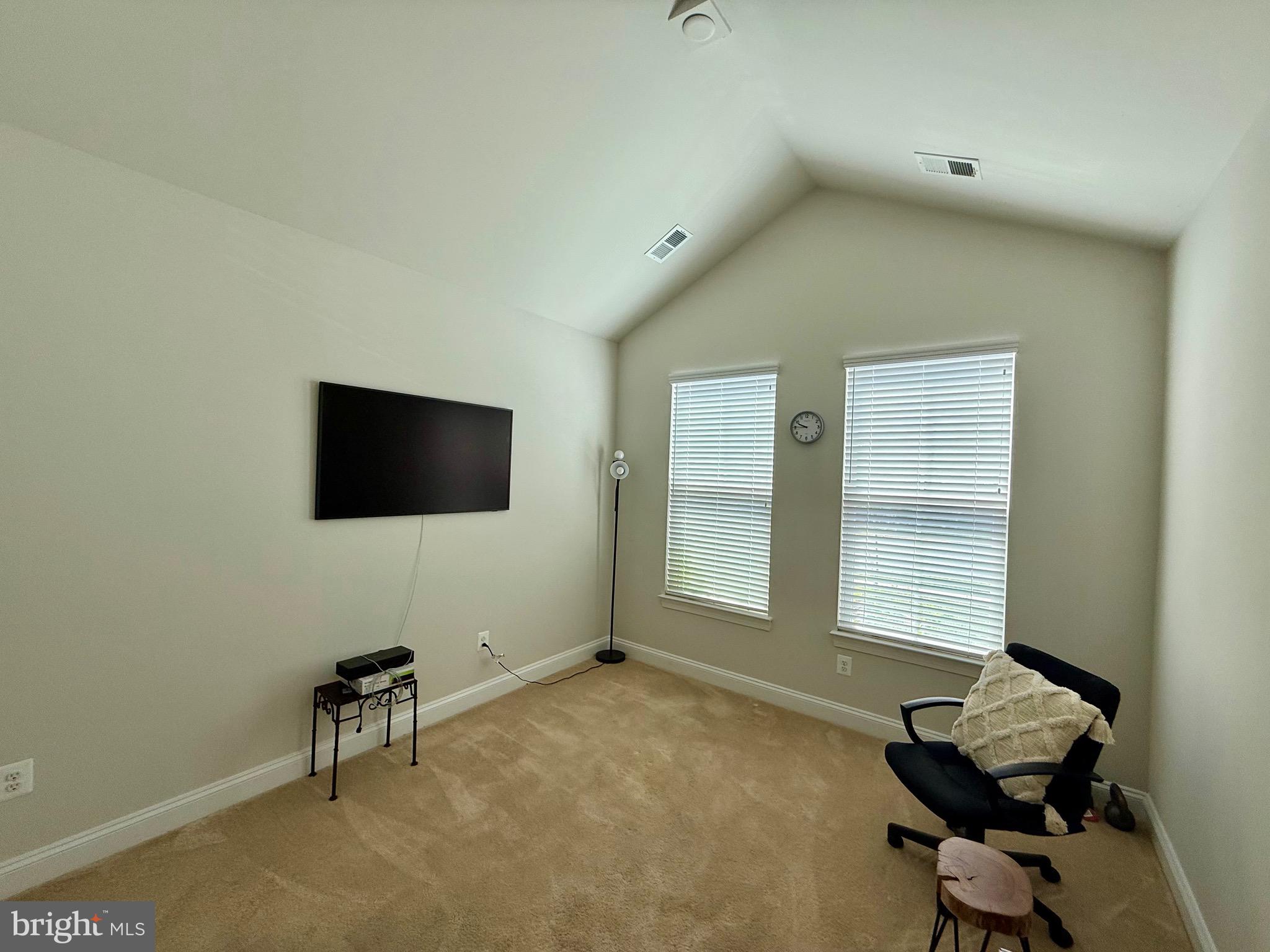 3148 Sunny Ridge Drive Odenton, MD 21113 - Photo 10 of 32 a living room with furniture and a flat screen tv