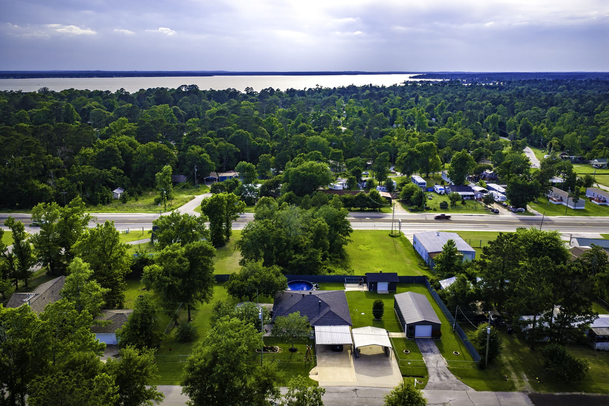 188 Huckleberry Road Onalaska, TX 77360 - Photo 42 of 49 a view of yard with swimming pool and outdoor space