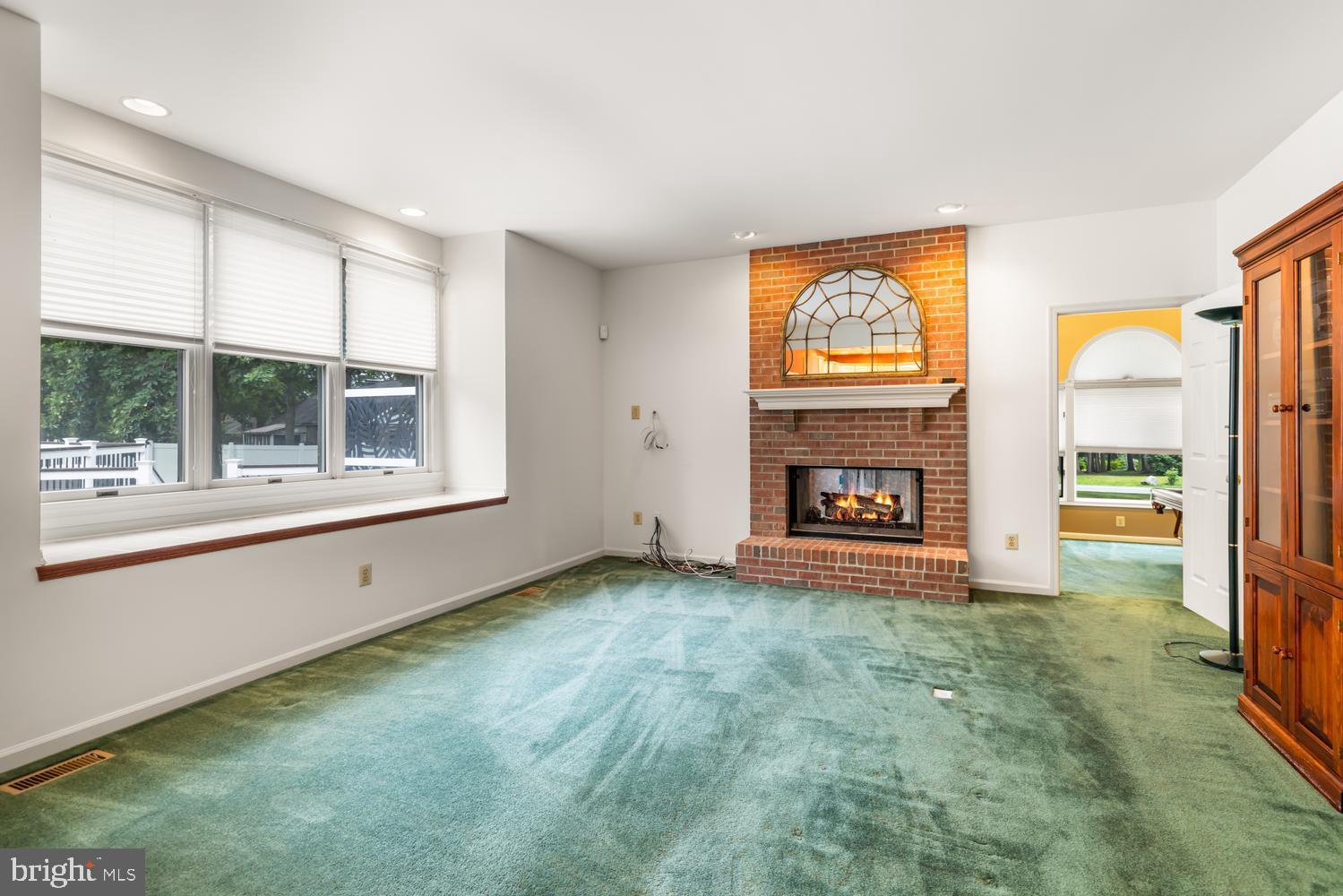 345 Reinert Road Hatfield, PA 19440 - Photo 14 of 45 Family Room with two-sided fireplace