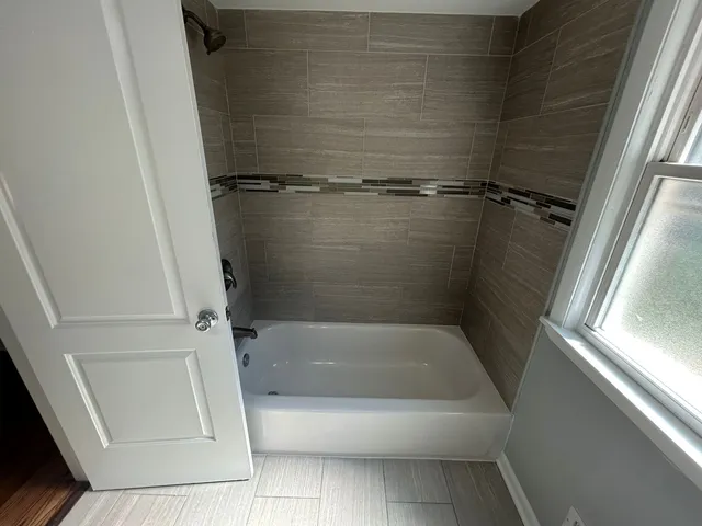 a bathroom with a bathtub