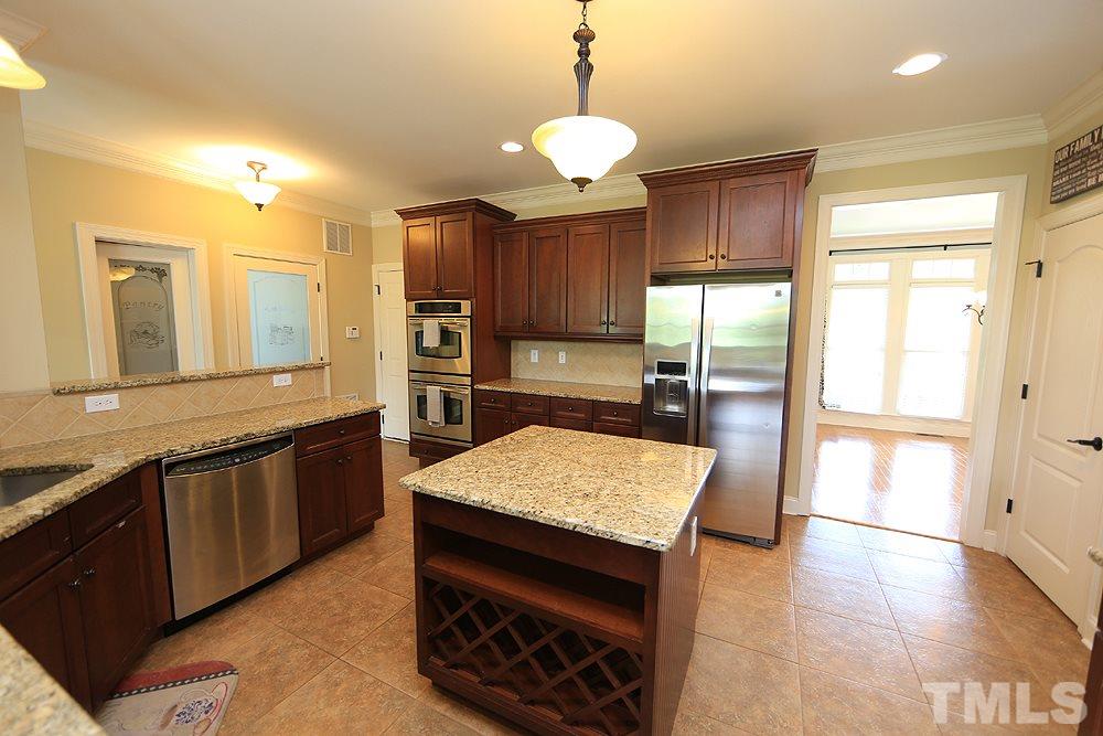 637 Competition Road Raleigh, NC 27603 - Photo 15 of 30 Gourmet Kitchen is very spacious yet everything is within easy reach. Easy to be efficient here!