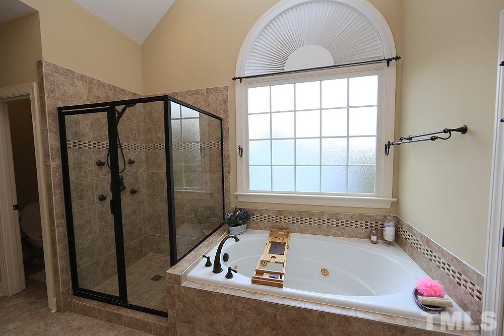 637 Competition Road Raleigh, NC 27603 - Photo 18 of 30 A versatile space to have that long hot bath when you just have to have it, yet everything you need to get that quick shower and get out the door in the morning. Very inviting with the natural light.