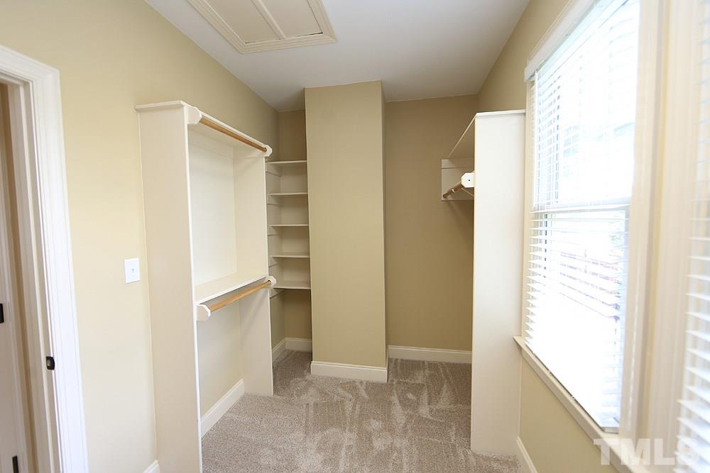 637 Competition Road Raleigh, NC 27603 - Photo 20 of 30 Wonderful walk in closet directly off of the Master Bath. Built ins are a nice touch.