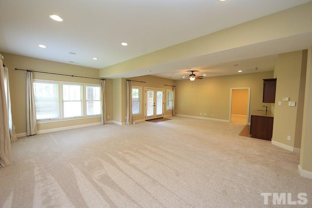 637 Competition Road Raleigh, NC 27603 - Photo 27 of 30 Pictures just don't do this space justice! There is so much room down here that you just have to see it to appreciate it. Not to mention there is a great, private, covered patio just past the double doors.