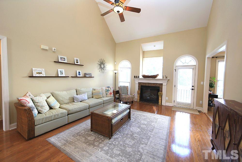 637 Competition Road Raleigh, NC 27603 - Photo 6 of 30 The spacious Great Room is so welcoming with abundant light from the outside. Large enough to entertain guests yet a cozy spot for the whole family to spend a quiet evening by the fireplace.