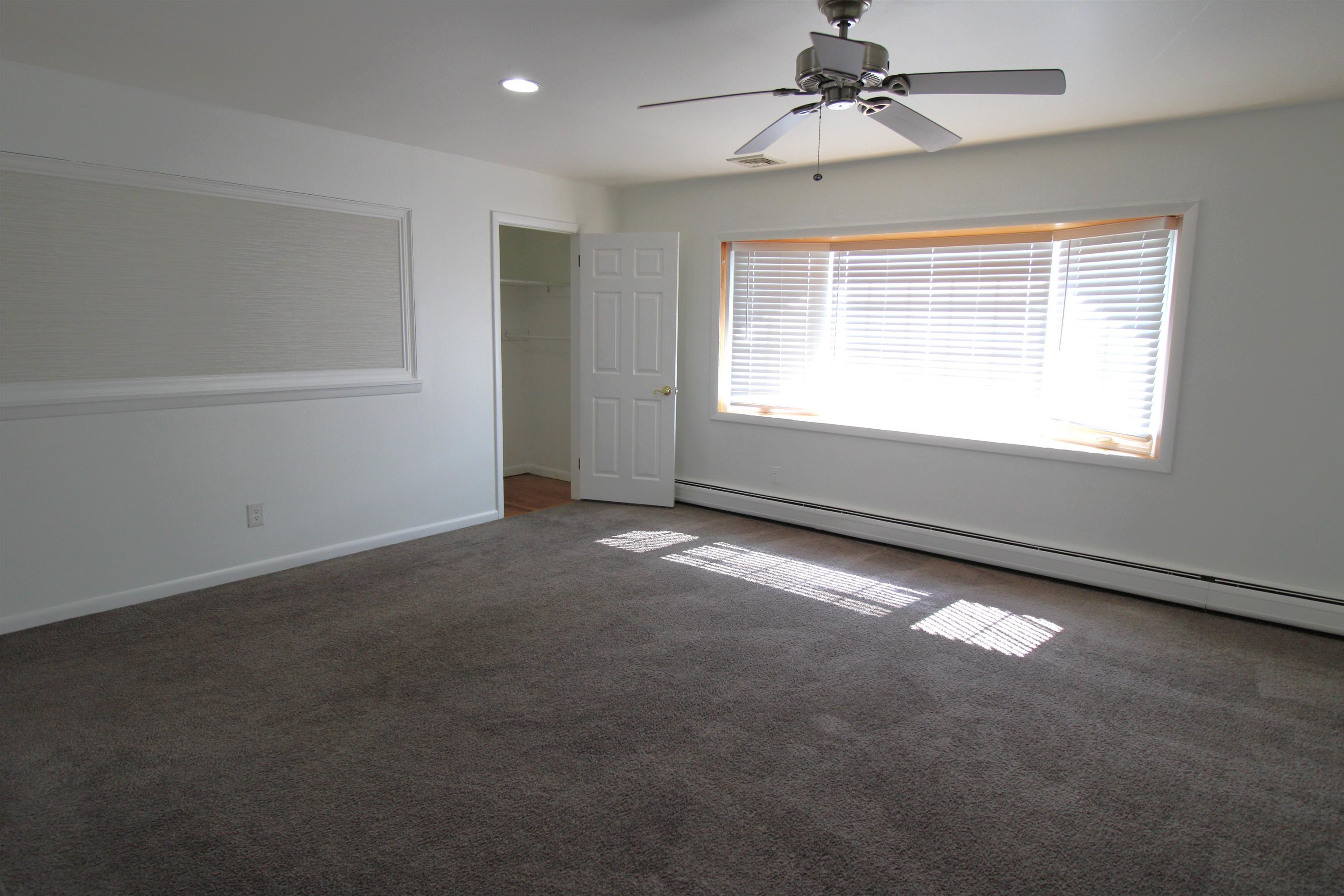 803 2nd Street, Unit 2 Secaucus, NJ 07094 - Photo 2 of 29 an empty room with a empty space and windows
