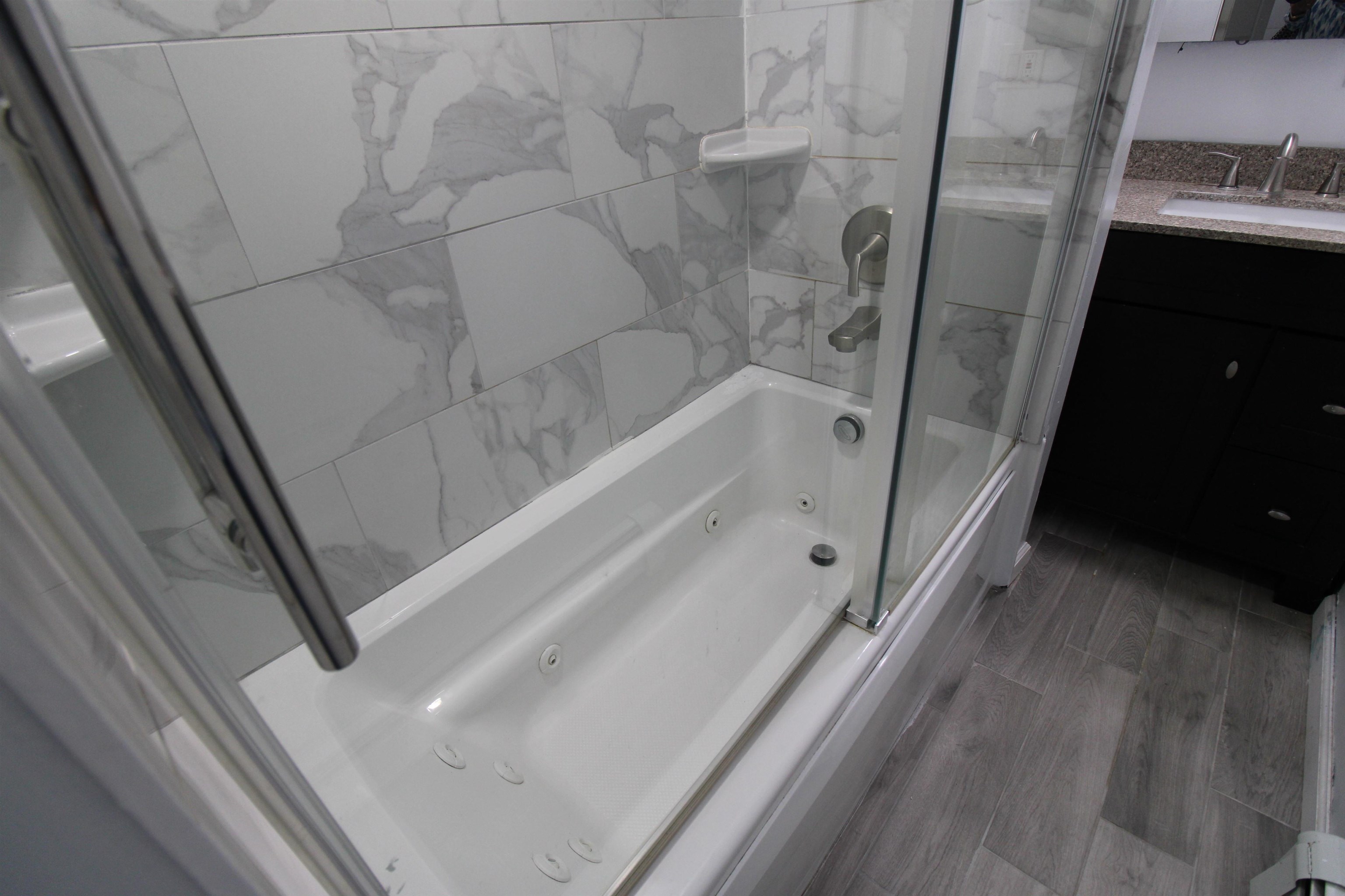 803 2nd Street, Unit 2 Secaucus, NJ 07094 - Photo 10 of 29 a bathroom with a bathtub