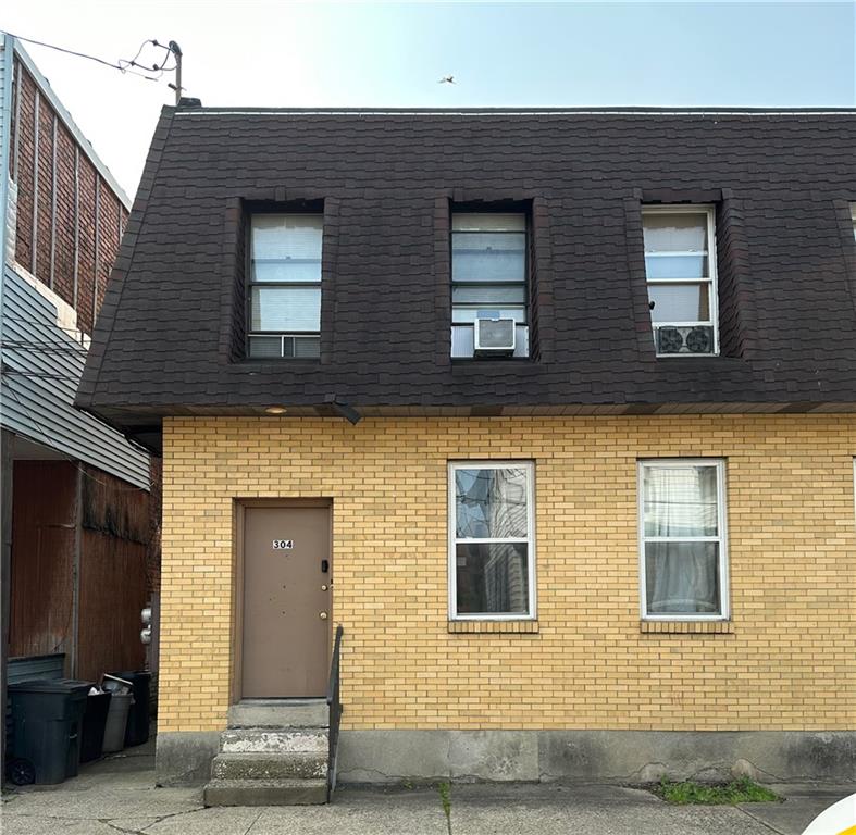 304 Campbell Street McKees Rocks, PA 15136 - Photo 2 of 3 a front view of a house