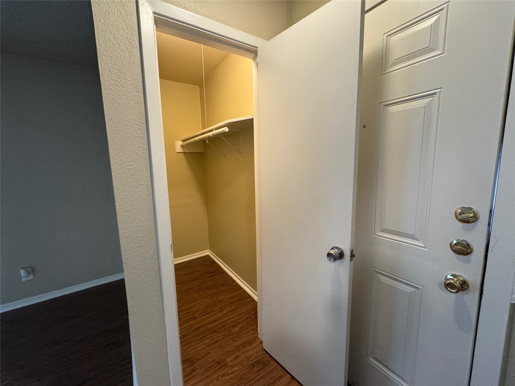4904 West Wind Trail, Unit 103 Austin, TX 78745 - Photo 9 of 22 a bathroom with a glass shower door