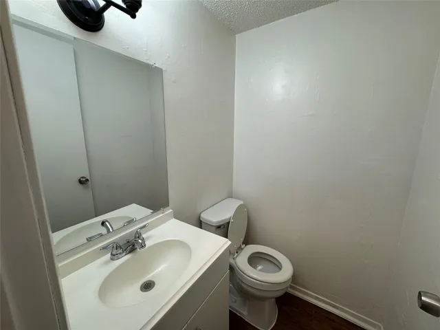 a bathroom with a sink and a toilet