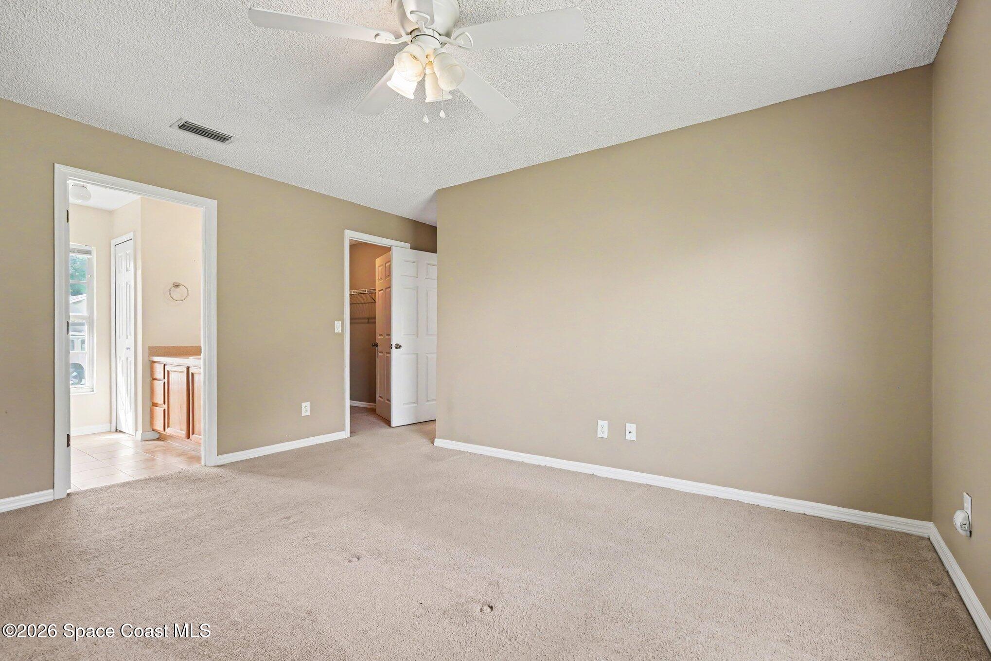 1154 Ida Way Melbourne, FL 32940 - Photo 16 of 27 Primary Bedroom
