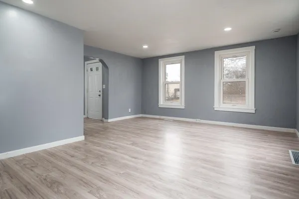 a view of cabinets with wooden floor