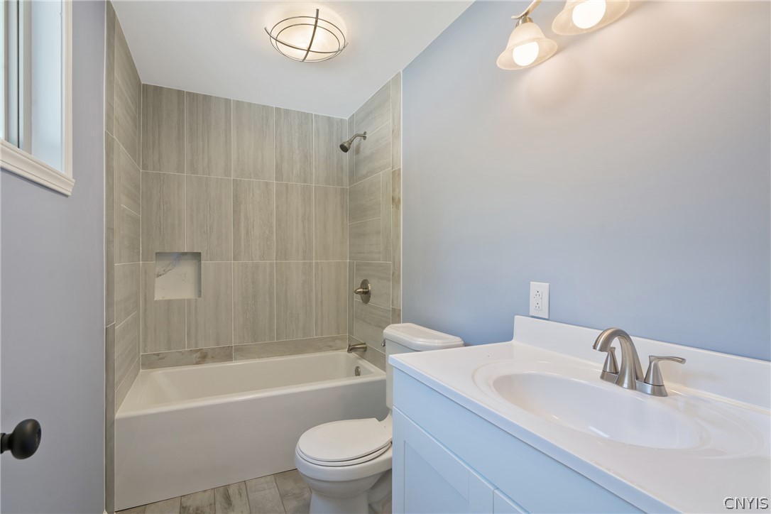 563 County Rte 12 Schroeppel, NY 13132 - Photo 23 of 39 Ahhh - a spa-like full bath en suite! You won't want to leave this truly divine space with all new posh choices and fixtures (and more of that sublime porcelain tile)!