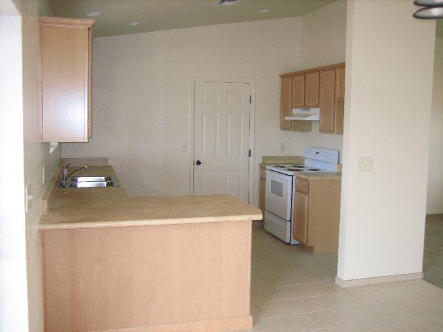 1063 Vereda Guadalajara Rio Rico, AZ 85648 - Photo 3 of 5 a utility room with dryer and washer