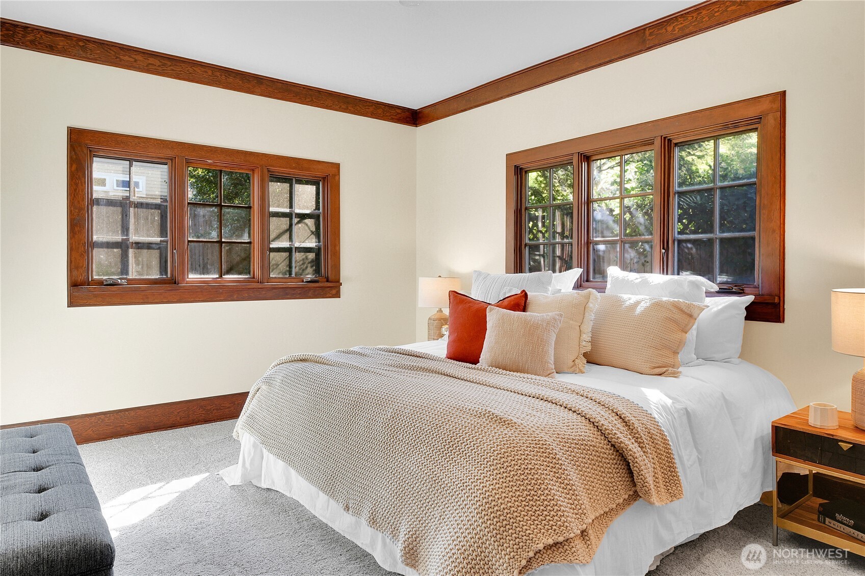 916 20th Avenue East Seattle, WA 98112 - Photo 13 of 28 a bedroom with a bed and a window