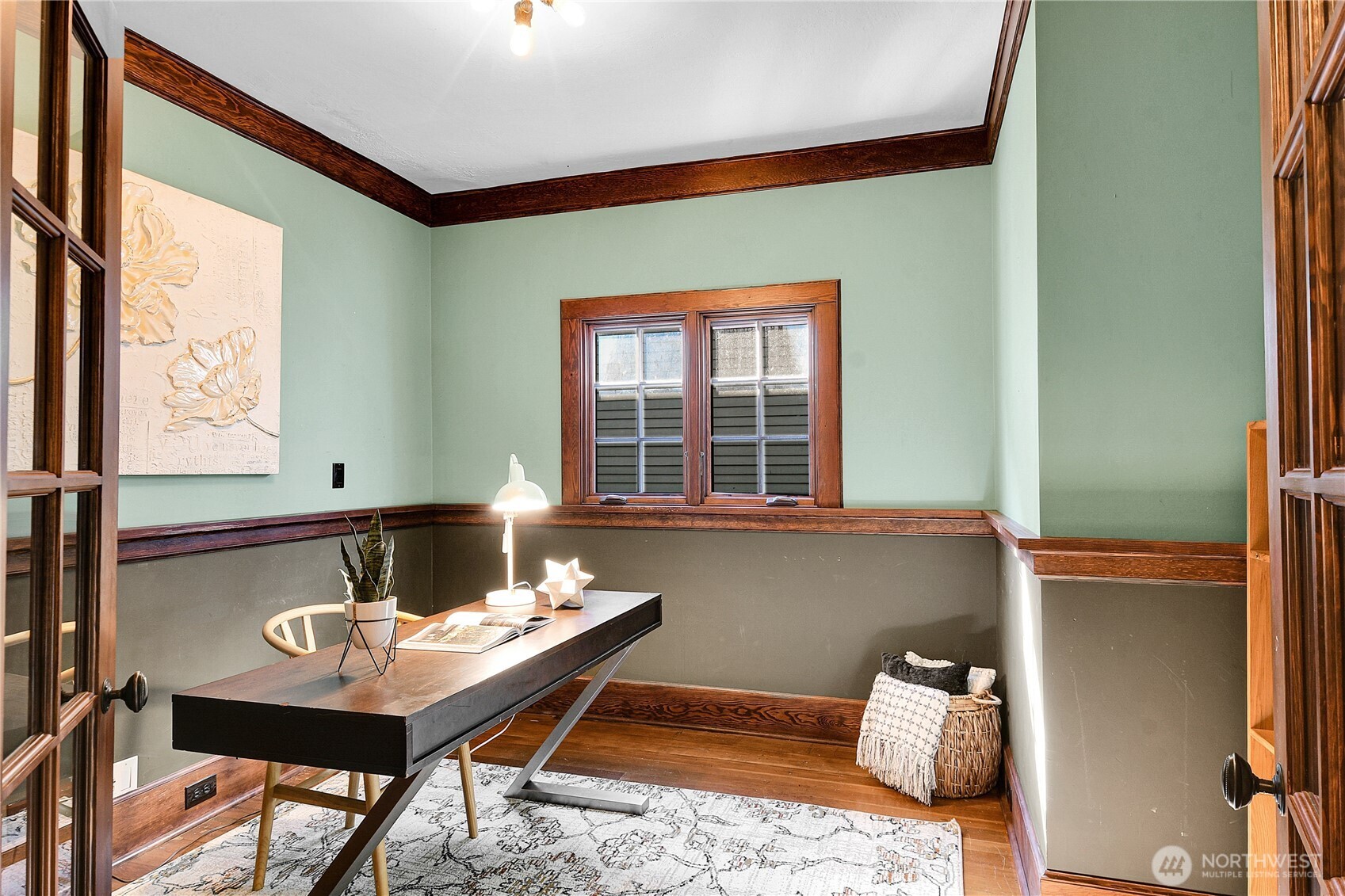916 20th Avenue East Seattle, WA 98112 - Photo 14 of 28 a living room with a window and a table