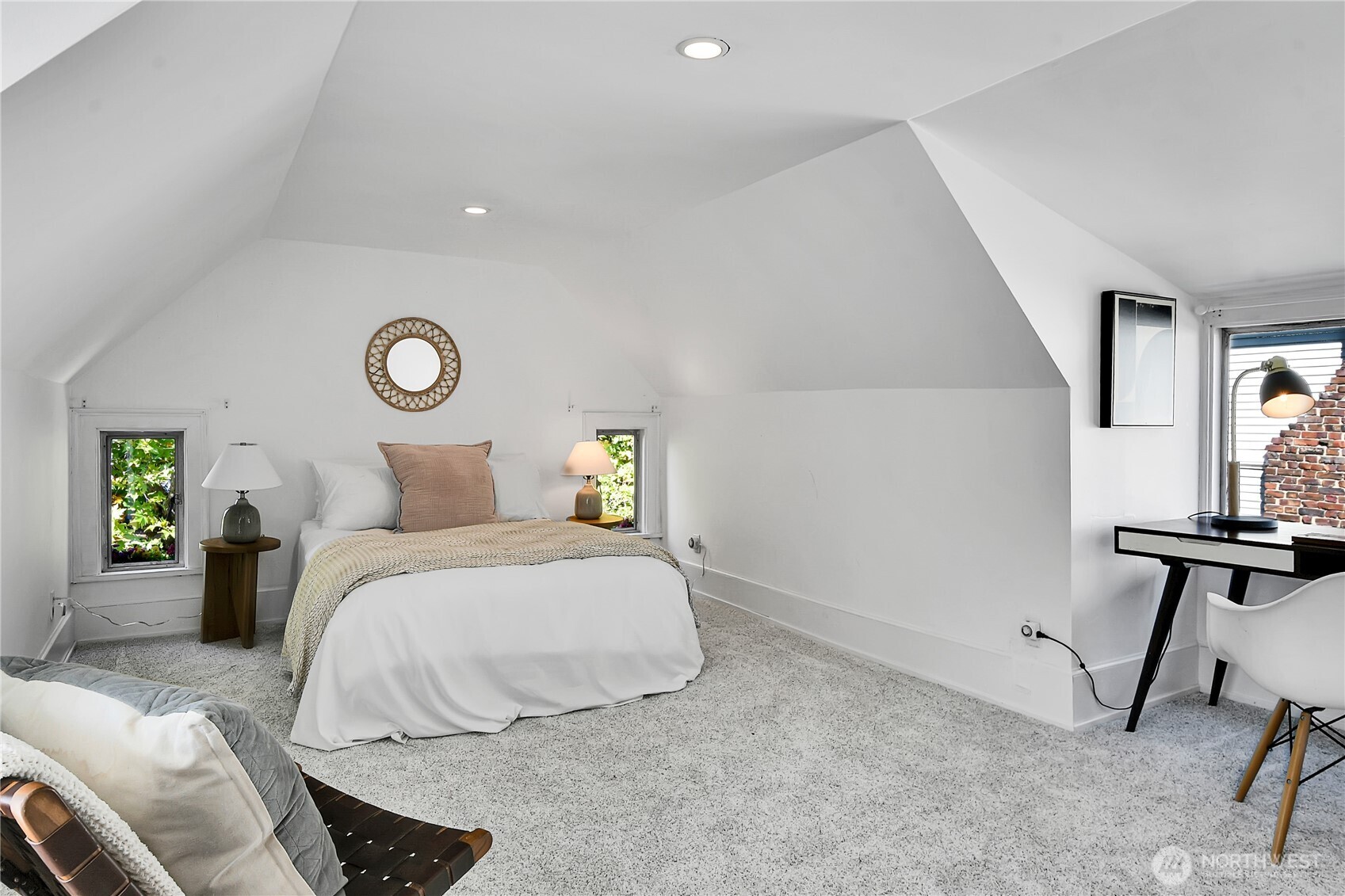 916 20th Avenue East Seattle, WA 98112 - Photo 19 of 28 a bedroom with a bed and a desk