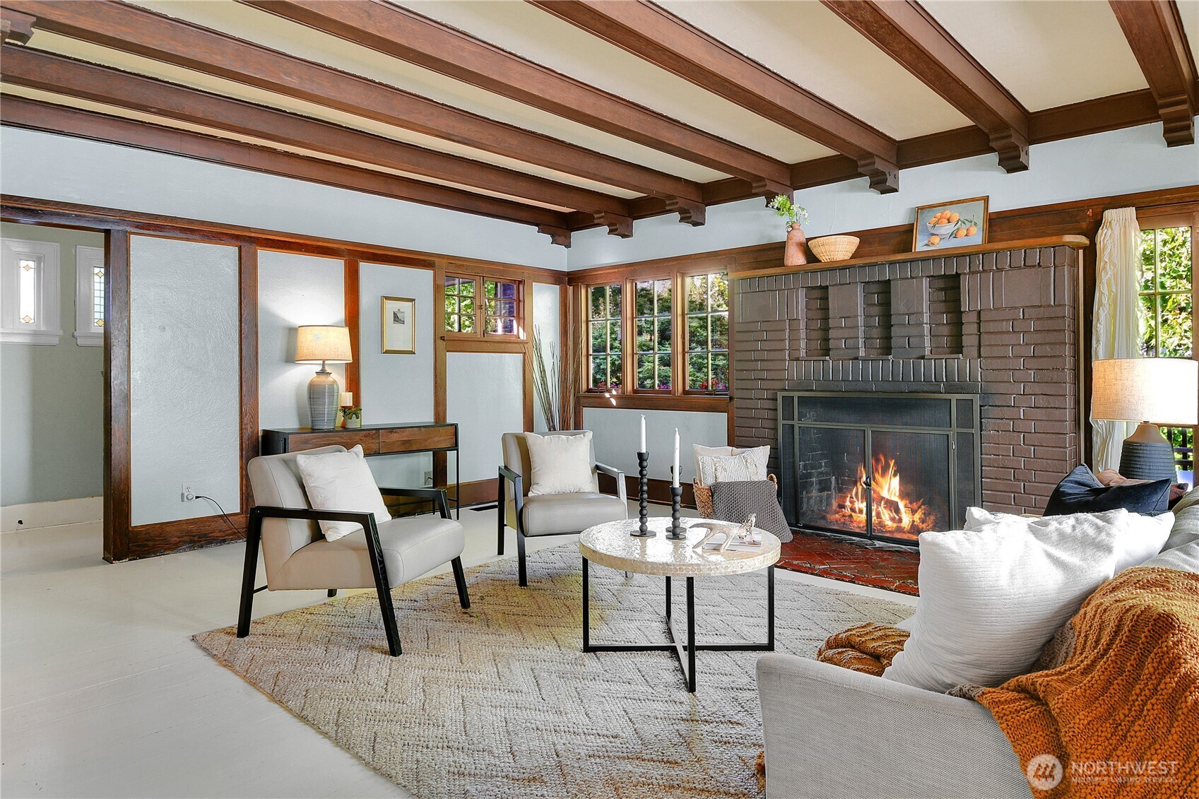 916 20th Avenue East Seattle, WA 98112 - Photo 2 of 28 a view of a livingroom with furniture and a fireplace