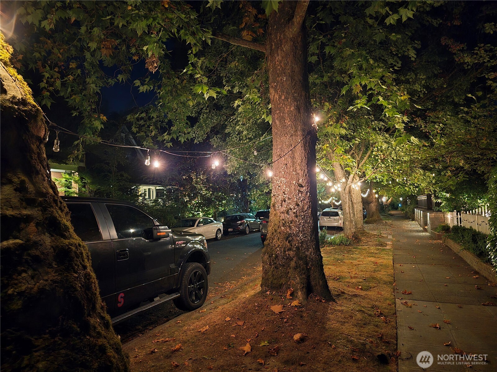 916 20th Avenue East Seattle, WA 98112 - Photo 26 of 28 a outdoor space with lots of yellow lighting