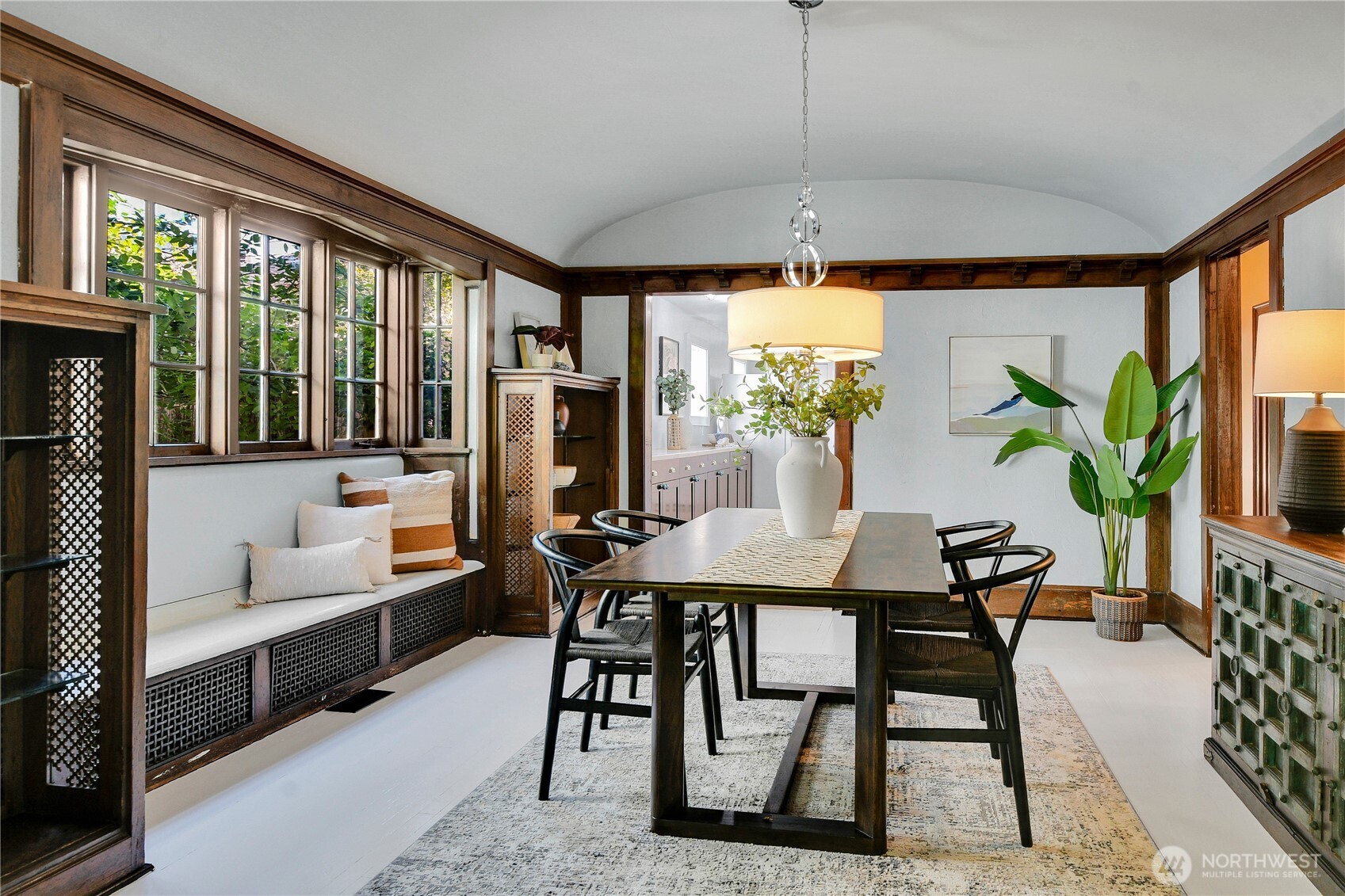 916 20th Avenue East Seattle, WA 98112 - Photo 5 of 28 a view of a dining room with furniture window and outside view