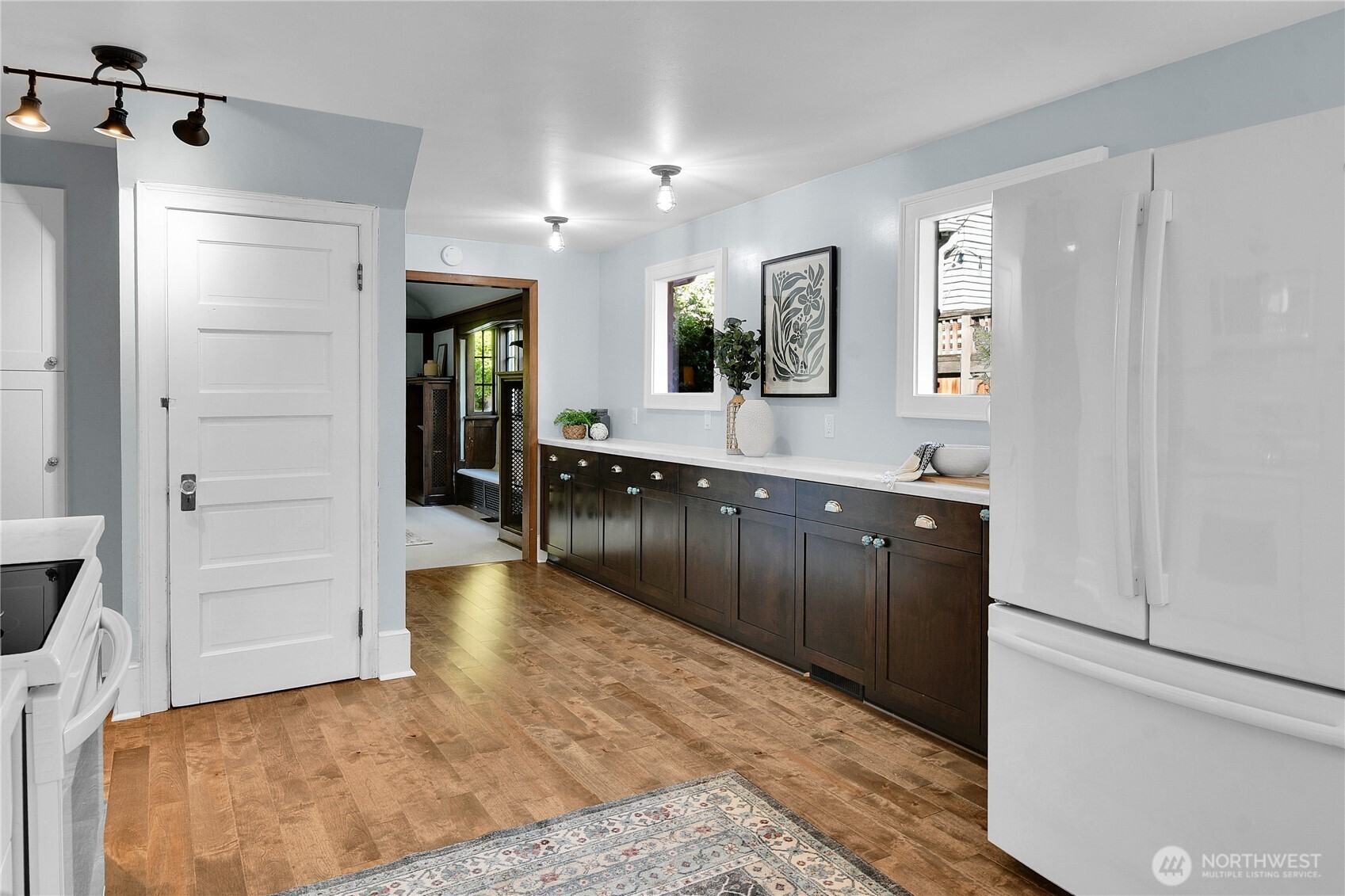 916 20th Avenue East Seattle, WA 98112 - Photo 8 of 28 a bathroom with a sink and a mirror