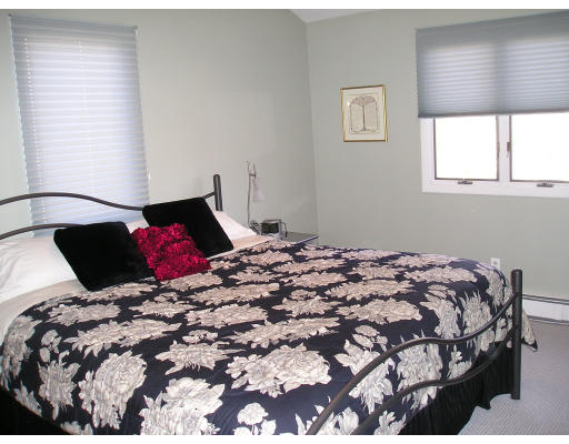 29 Alden Road Needham, MA 02492 - Photo 3 of 6 a bedroom with a bed and window