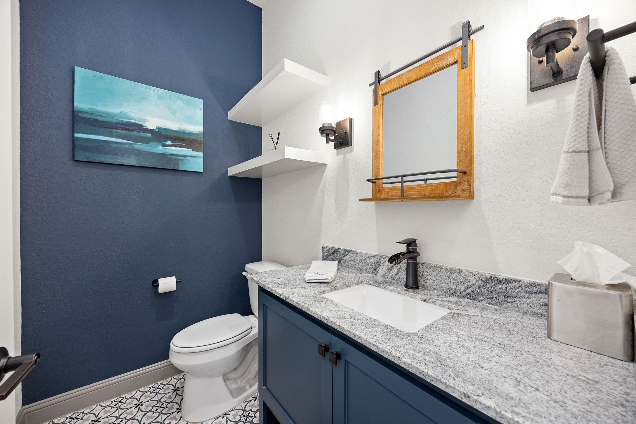86 Dawns Edge Conroe, TX 77356 - Photo 17 of 50 a bathroom with a granite countertop sink a toilet and mirror