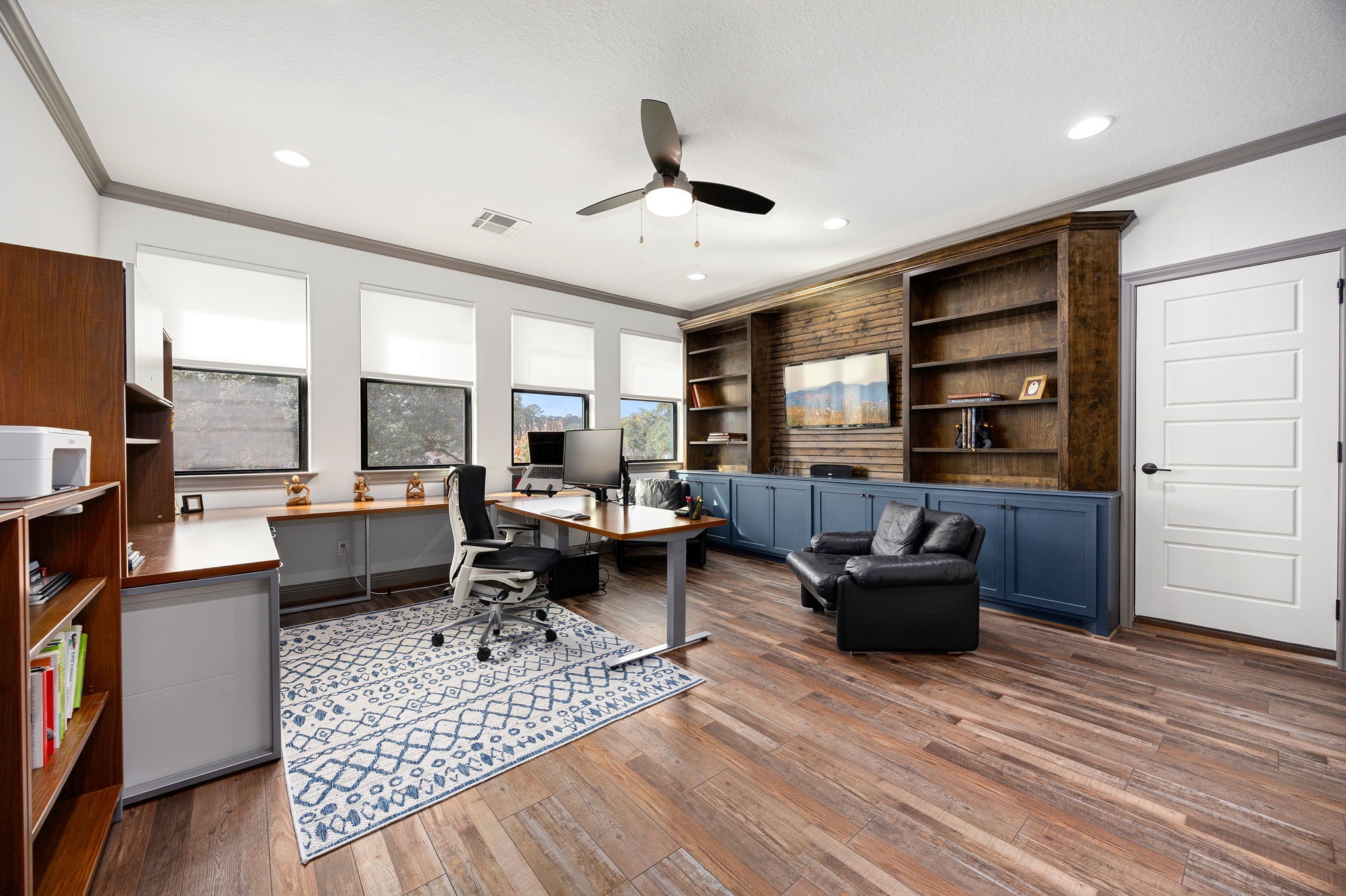86 Dawns Edge Conroe, TX 77356 - Photo 31 of 50 a living room with furniture and a flat screen tv