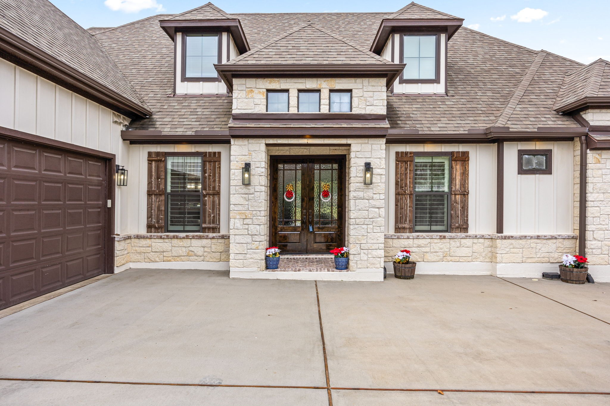 86 Dawns Edge Conroe, TX 77356 - Photo 49 of 50 a view of a brick house with many windows