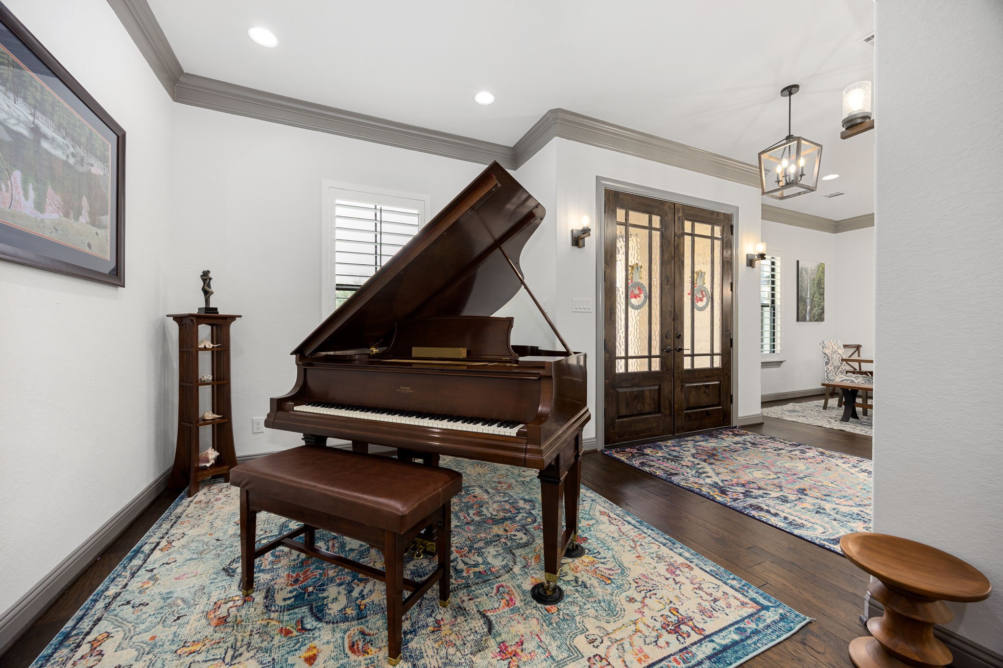 86 Dawns Edge Conroe, TX 77356 - Photo 5 of 50 The home features a beautiful piano room, perfect for music lovers or easily adaptable as a sitting room, study, or flex space.