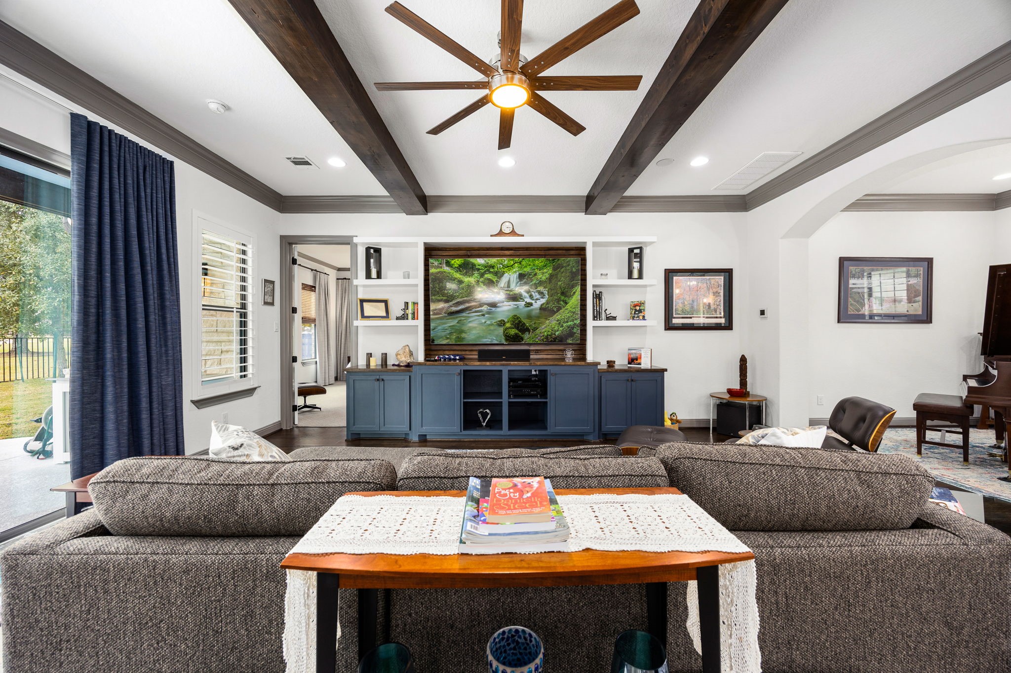 86 Dawns Edge Conroe, TX 77356 - Photo 9 of 50 a living room with furniture and a flat screen tv
