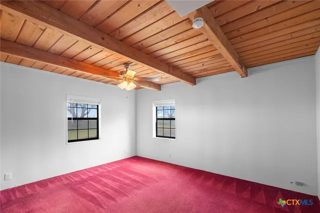 a view of a room with a large window