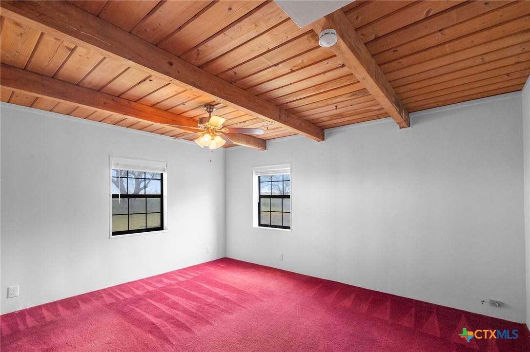 1967 Fleming Prairie Road Victoria, TX 77905 - Photo 15 of 33 a view of a big room with wooden floor and windows