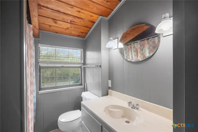 a view of a backyard with a tub