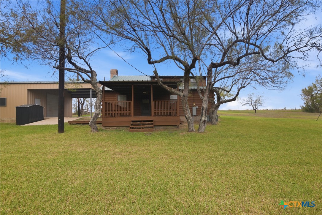 1967 Fleming Prairie Road Victoria, TX 77905 - Photo 22 of 33 a house with swimming pool in front of it