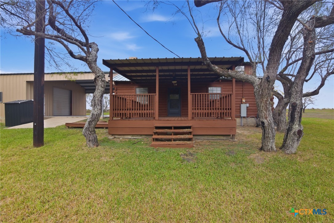 1967 Fleming Prairie Road Victoria, TX 77905 - Photo 24 of 33 a view of a lounge chair in the grass