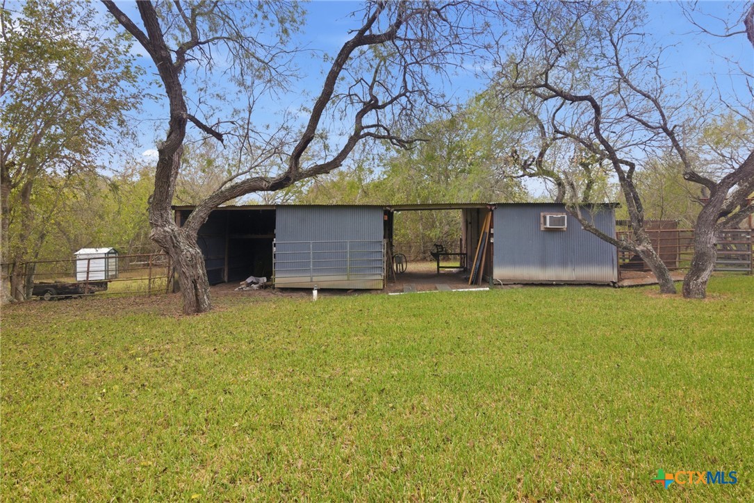 1967 Fleming Prairie Road Victoria, TX 77905 - Photo 25 of 33 a backyard of a house with lots of green space