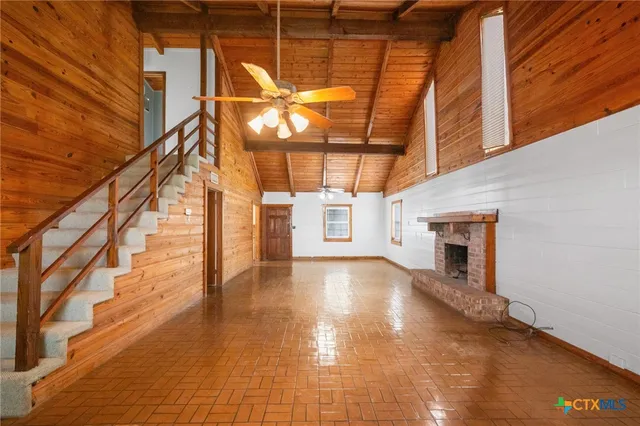 a view of an entryway with a fireplace