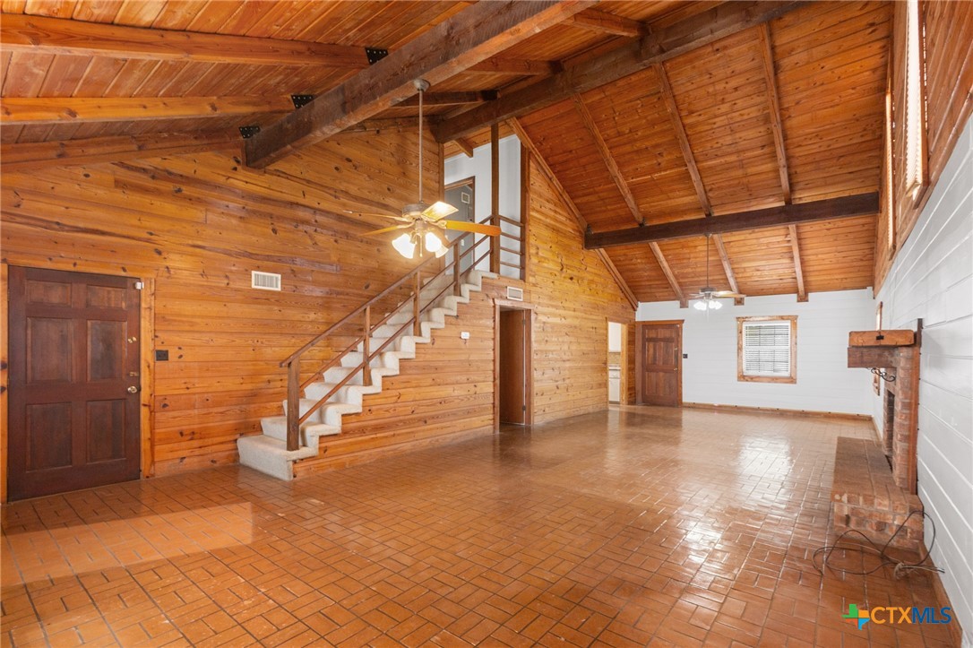 1967 Fleming Prairie Road Victoria, TX 77905 - Photo 8 of 33 a view of a hallway with wooden floor