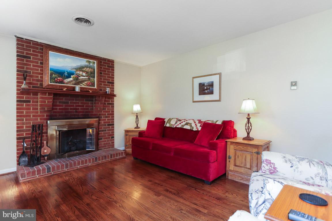 2227 Coon Club Road Westminster, MD 21157 - Photo 17 of 52 Cozy Brick - Gas Fireplace and Wood Mantle