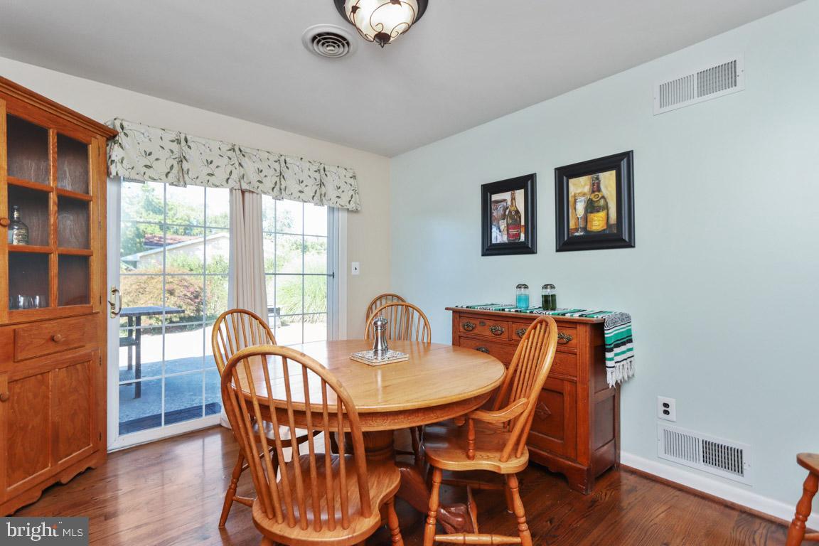 2227 Coon Club Road Westminster, MD 21157 - Photo 19 of 52 Bright Dining Room with Fr Slider to Patio