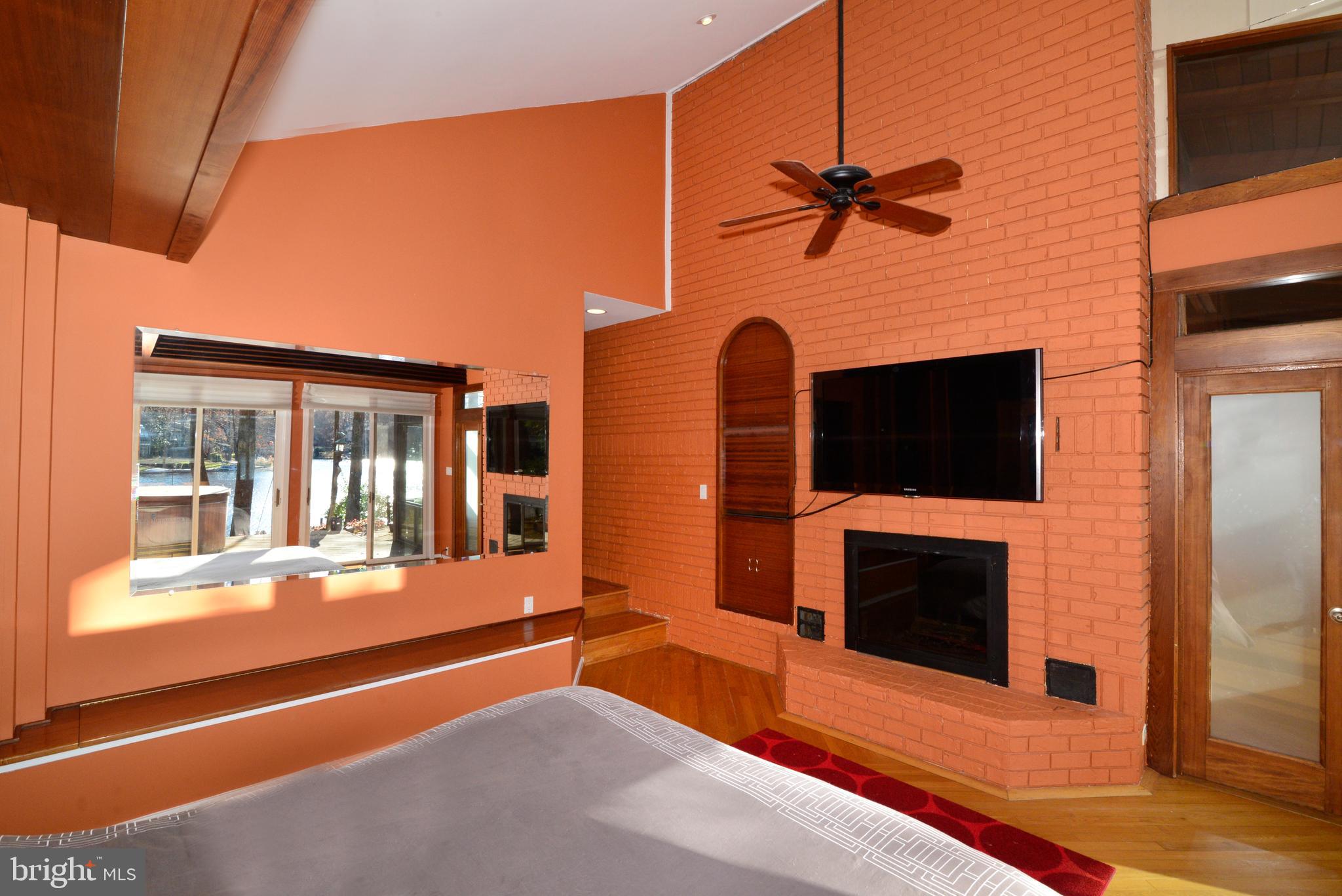 1934 Upper Lake Drive Reston, VA 20191 - Photo 39 of 60 The owner's suite has a wood-burning fireplace.