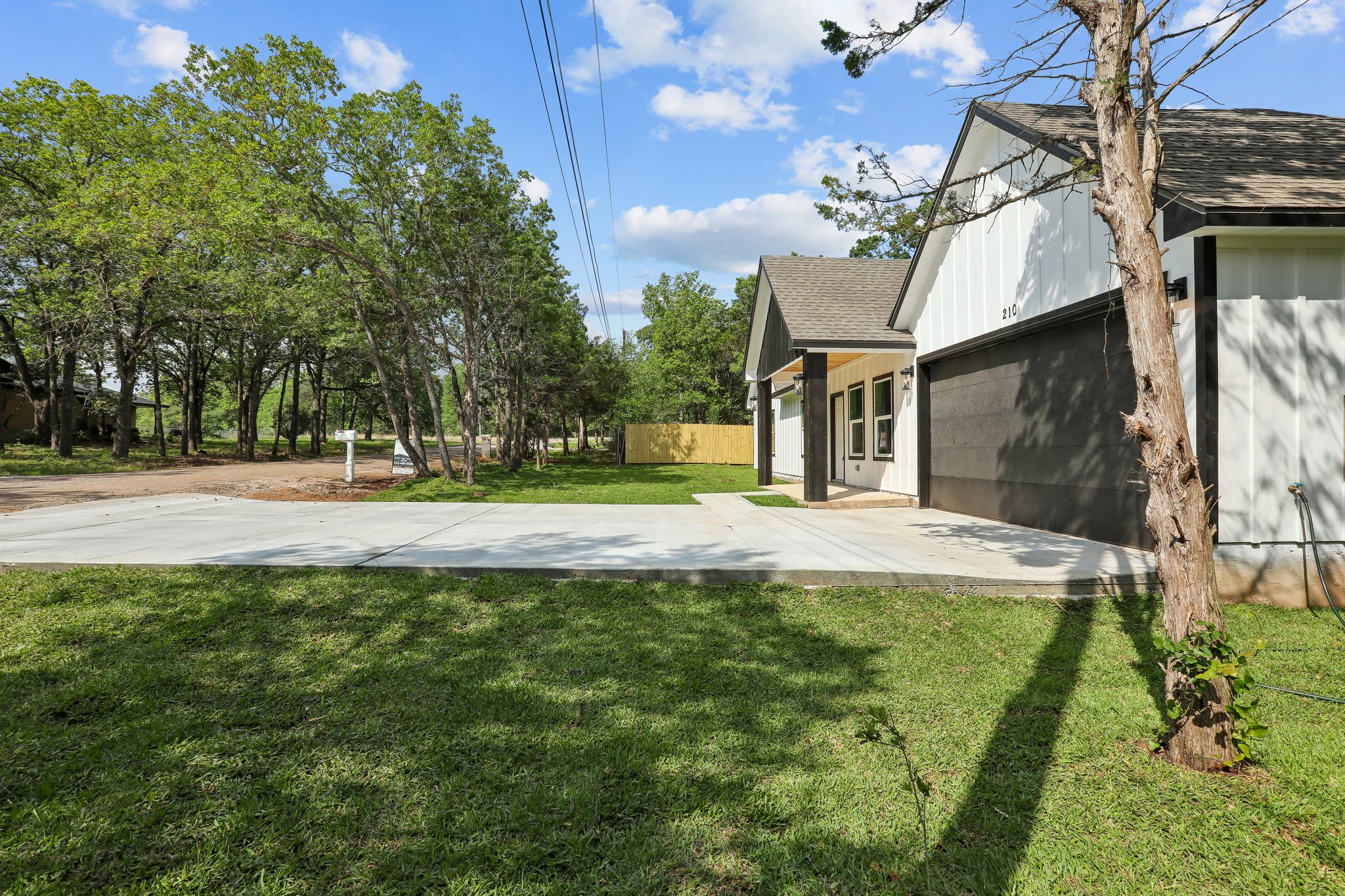 210 Flint Ridge Street Bastrop, TX 78602 - Photo 4 of 40 a front view of house with yard