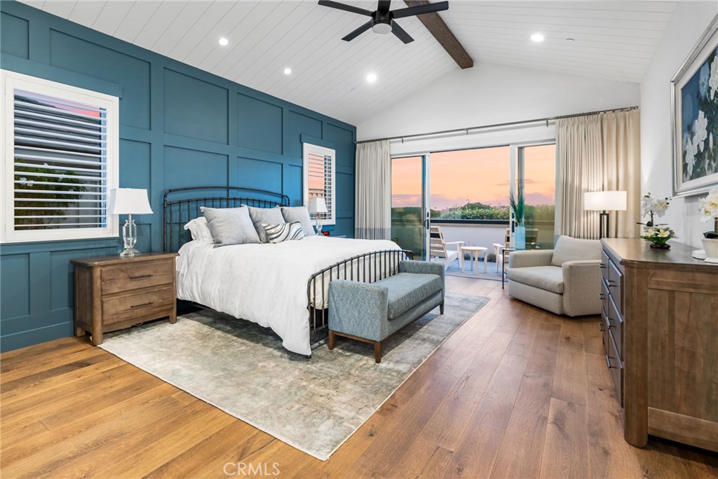 1231 Sand Key Corona del Mar, CA 92625 - Photo 11 of 65 a bedroom with a large bed and a couch